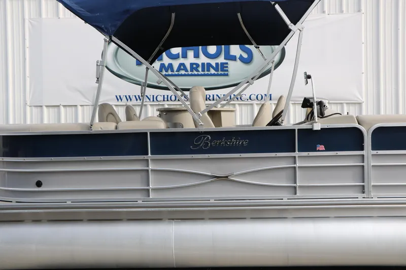 Slide: The Image of 2017 Berkshire 22 E CTS pontoon boat with blue canopy at Nichols Marine. - 10