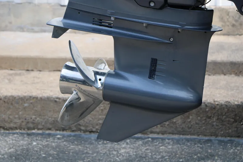 Slide: The Image of Close-up of a 2017 Berkshire 22 E CTS boat propeller and lower unit. - 13