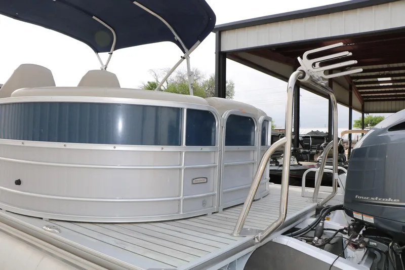 Slide: The Image of 2017 Berkshire 22 E CTS pontoon boat with canopy and outboard motor. - 16