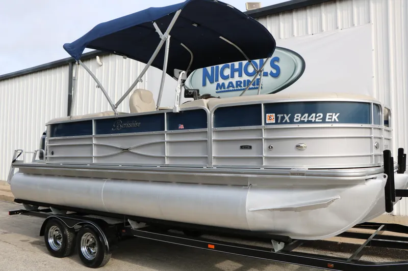 Slide: The Image of 2017 Berkshire 22 E CTS pontoon boat with canopy on trailer at Nichols Marine. - 2
