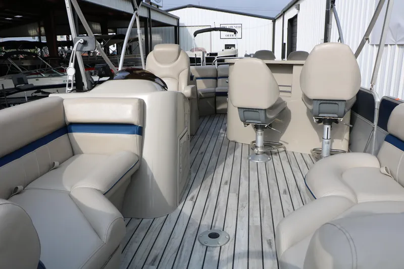 Slide: The Image of Luxurious interior of a 2017 Berkshire 22 E CTS pontoon boat with plush seating. - 21