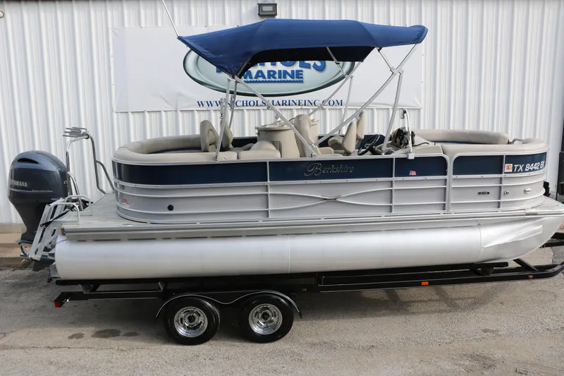 Slide: The Image of 2017 Berkshire 22 E CTS pontoon boat with blue canopy on trailer. - 9