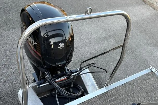 Slide: The Image of 2015 Bennington 24 SLX boat with Mercury outboard motor, rear view. - 10