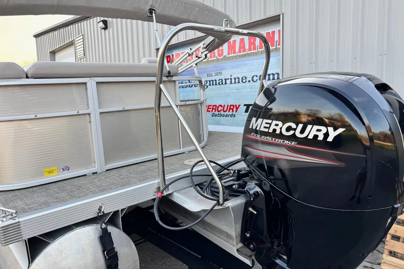 Slide: The Image of 2015 Bennington 24 SLX pontoon boat with Mercury FourStroke outboard engine. - 11