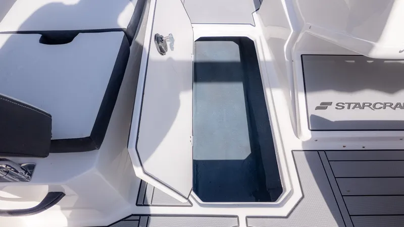 Slide: The Image of Starcraft SV 18 OB 2026 boat with open storage compartment. - 14