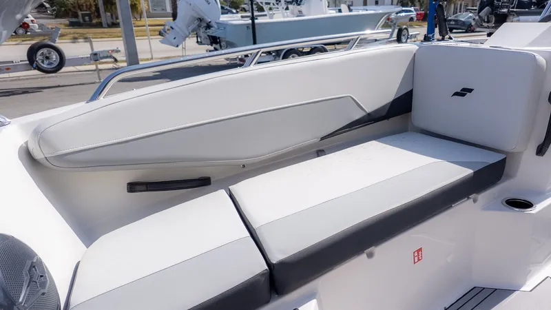 Slide: The Image of Interior of 2026 Starcraft SV 18 OB with white seating area. - 19