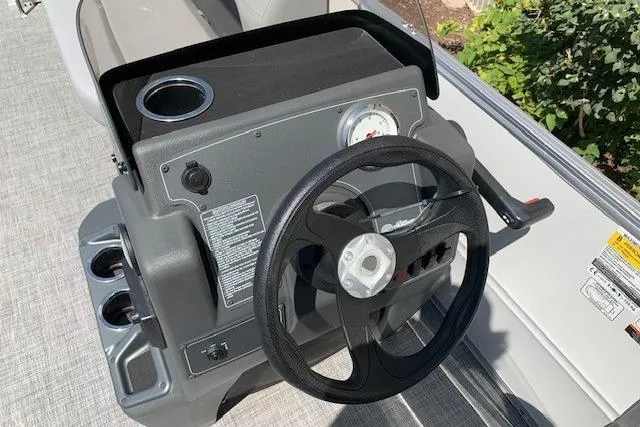 Slide: The Image of Steering console of 2026 Sun Tracker Party Barge 16 DLX pontoon boat. - 25