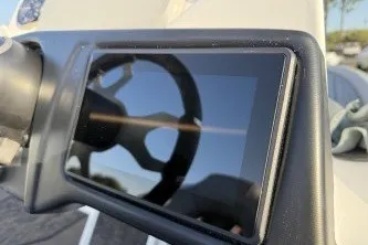 Slide: The Image of 2026 Nitro Z21 XL Pro dashboard with touchscreen display and steering wheel reflection. - 6