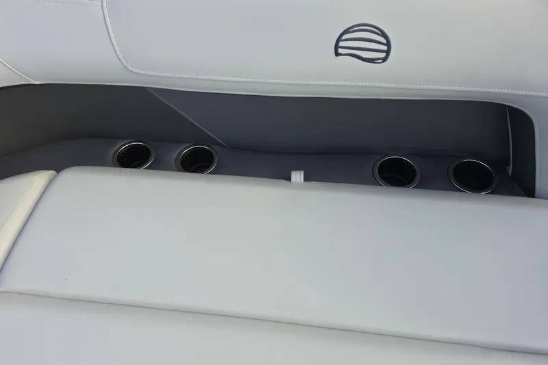 Slide: The Image of Interior seating with cup holders on 2026 Sun Tracker Party Barge 16 DLX. - 5