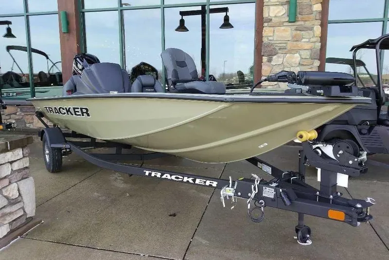 The Image of 2026 Tracker Pro Team 175 fishing boat on trailer, displayed outdoors. - 0