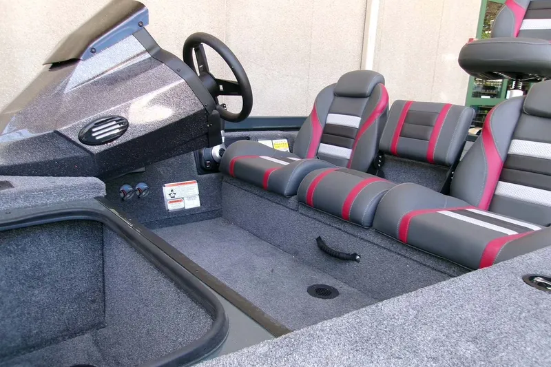 Slide: The Image of 2026 Ranger RT178C boat interior with sleek seats and modern dashboard design. - 5