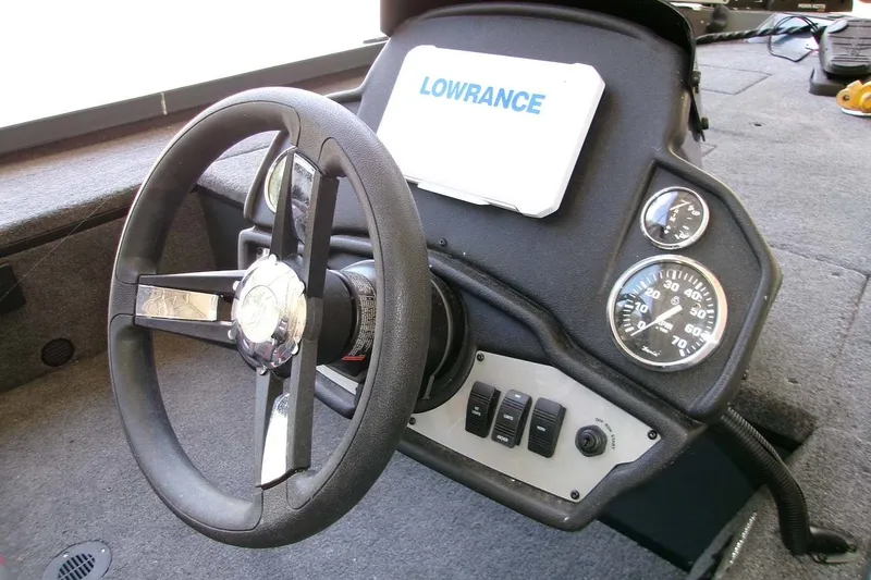 Slide: The Image of Steering console of 2026 Ranger RT178C boat with Lowrance display and gauges. - 6