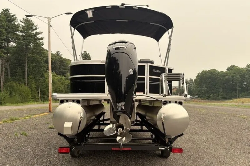 Slide: The Image of 2026 Sun Tracker Party Barge 20 DLX pontoon boat with canopy and outboard motor. - 7