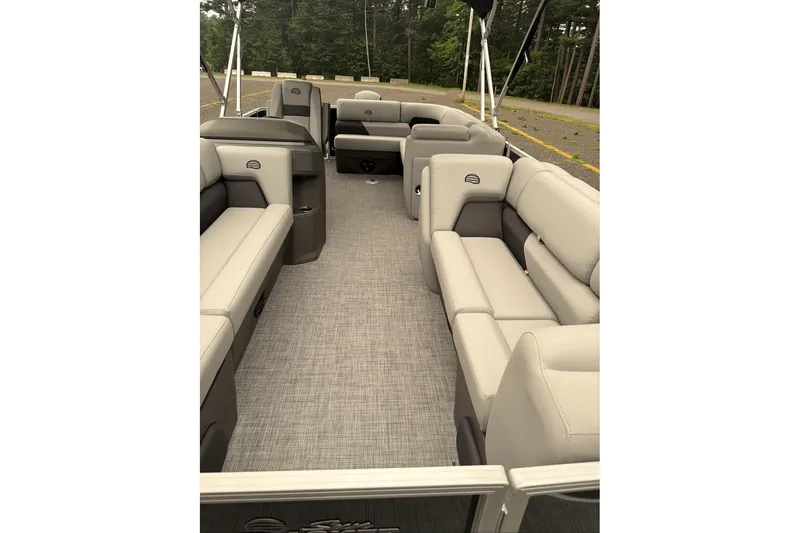 Slide: The Image of 2026 Sun Tracker Party Barge 20 DLX interior with spacious seating and modern design. - 9