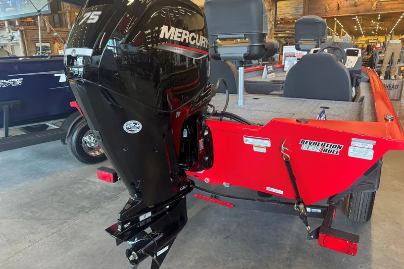 Slide: The Image of 2026 Tracker Pro Team 175 boat with Mercury engine, displayed indoors. - 53