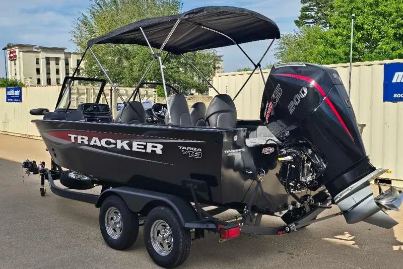 The Image of 2026 Tracker Targa V-19 Combo boat with powerful outboard motor on trailer. - 0