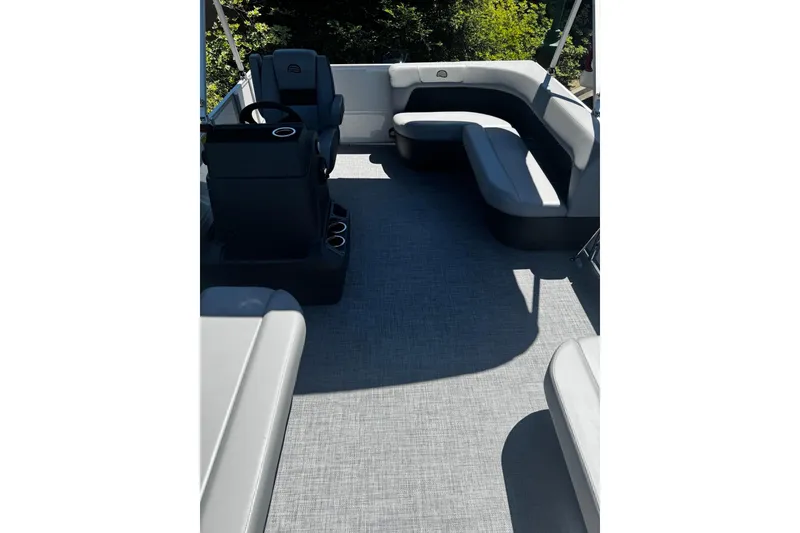 Slide: The Image of 2026 Sun Tracker Party Barge 16 DLX interior with spacious seating and modern design. - 62