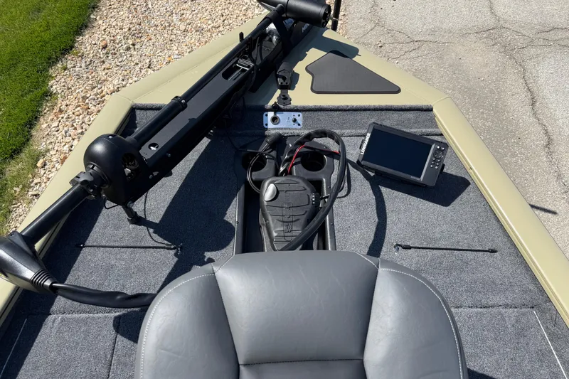 Slide: The Image of 2026 Tracker Pro Team 195 boat deck with navigation equipment and seating. - 5