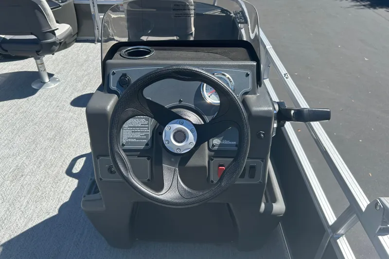 Slide: The Image of Steering console of 2026 Sun Tracker Bass Buggy 18 DLX pontoon boat. - 19