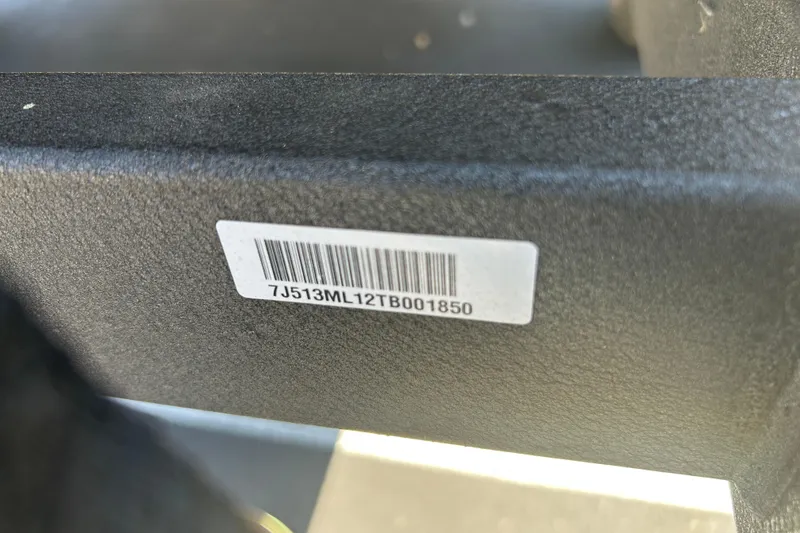 Slide: The Image of Barcode label on 2026 Sun Tracker Bass Buggy 18 DLX boat component. - 113