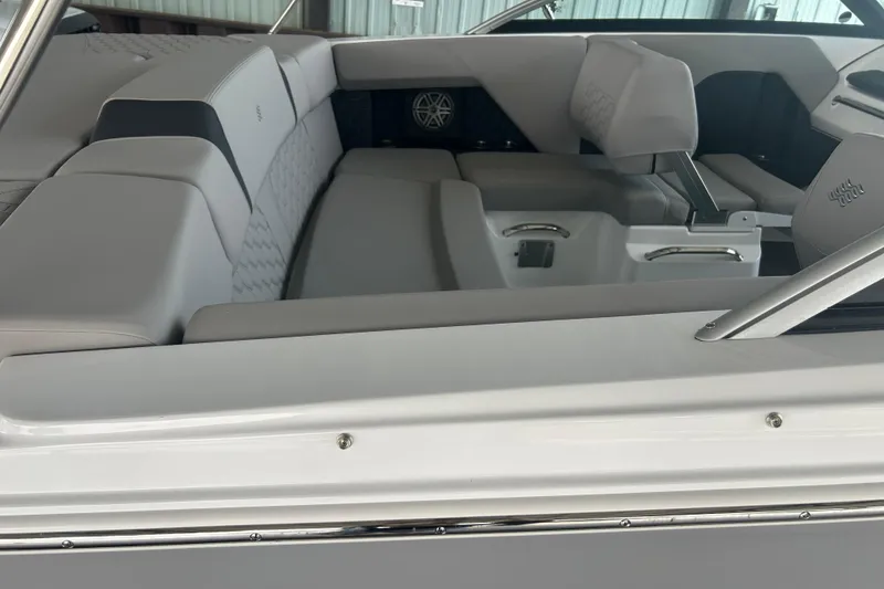 Slide: The Image of Interior of 2025 Four Winns H2 boat, featuring sleek gray seating and modern design. - 4