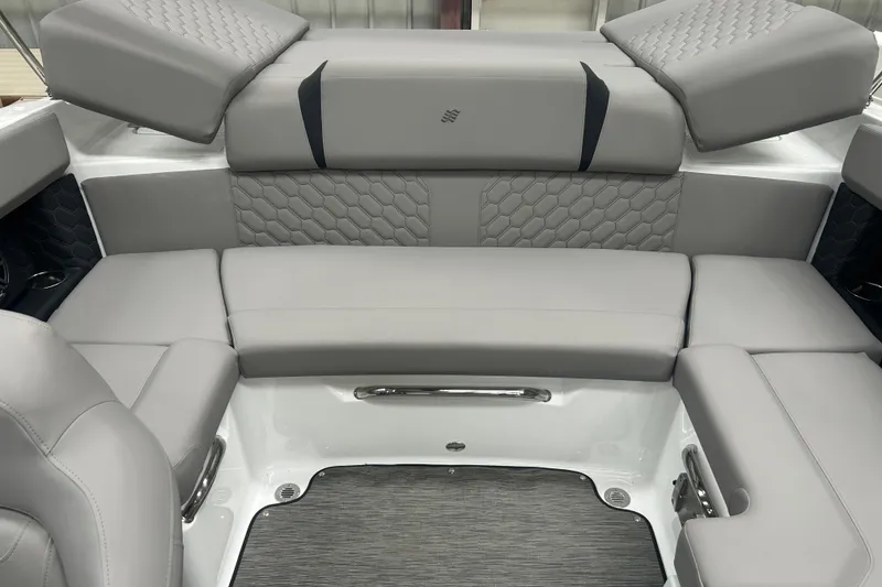 Slide: The Image of Luxurious seating area in the 2025 Four Winns H2 boat, featuring elegant gray upholstery. - 6