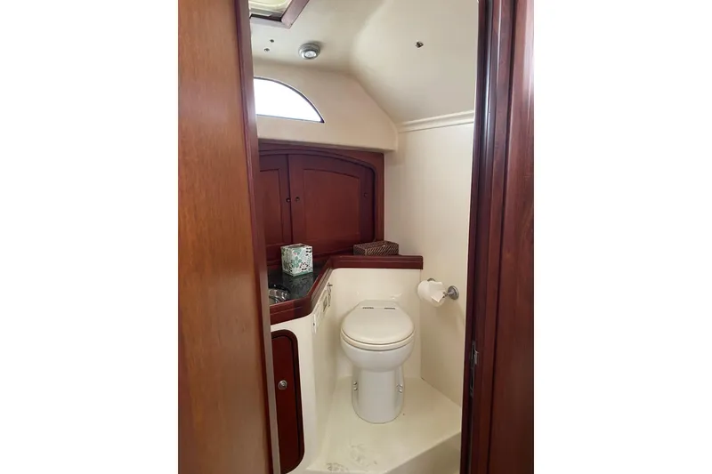 Slide: The Image of Marine head with wet down shower. - 12