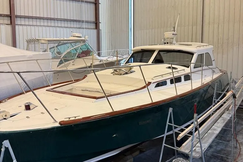 Slide: The Image of Waxing and brightwork done in 2025. The rumble seat is shown without green cushions. - 13