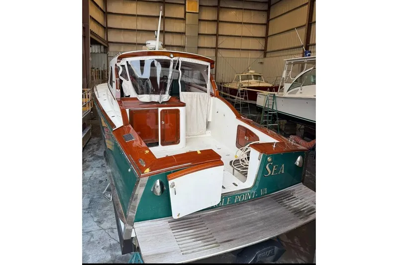 Slide: The Image of Transom door to teak swim platform. The wet bar is visible. - 19