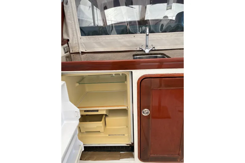 Slide: The Image of Cockpit wet bar with fridge and sink. - 3