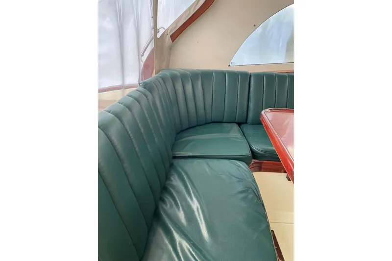 Slide: The Image of L-shaped settee converts to a queen sized berth. - 5