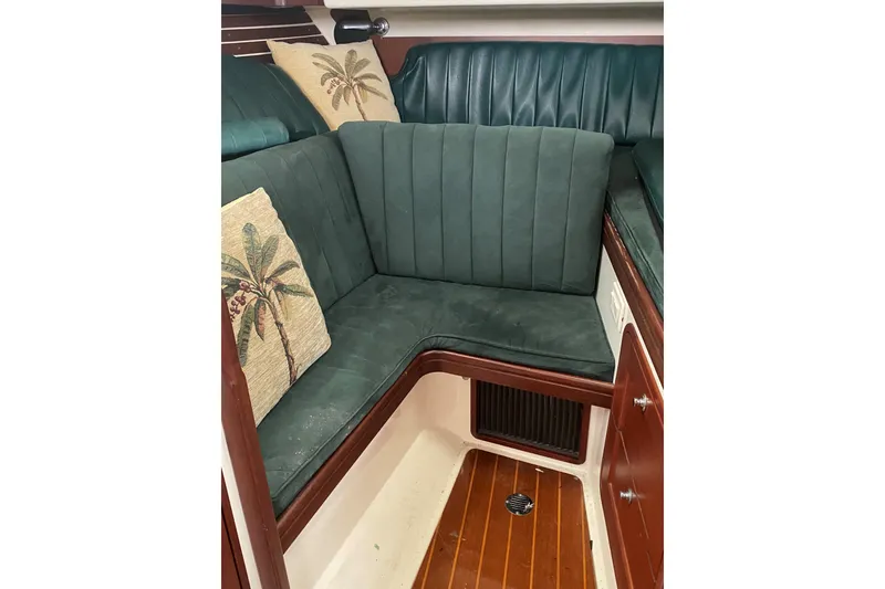 Slide: The Image of Forward double berth and settee that converts to a single. - 8