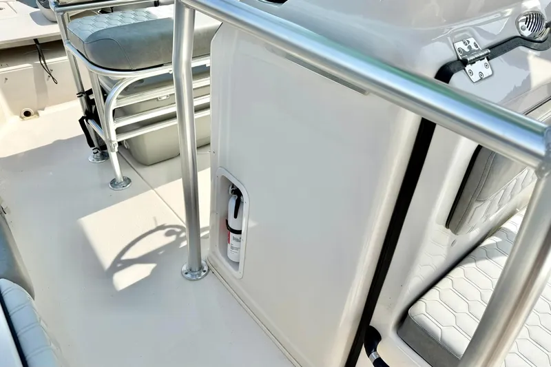Slide: The Image of 2026 Carolina Skiff 21 Ultra Elite boat interior with seating and safety equipment. - 20