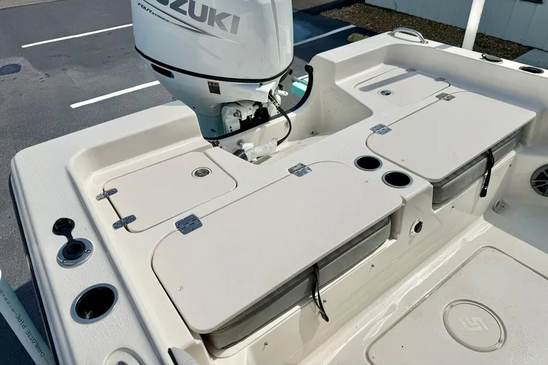 Slide: The Image of 2026 Carolina Skiff 21 Ultra Elite boat deck with Suzuki outboard motor. - 31