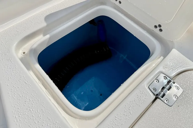 Slide: The Image of Livewell compartment on 2026 Carolina Skiff 21 Ultra Elite boat. - 36