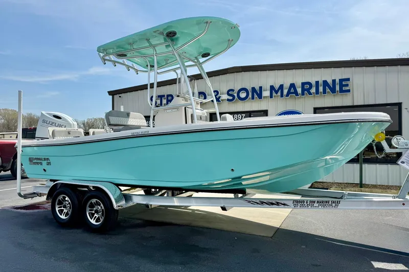Slide: The Image of 2026 Carolina Skiff 21 Ultra Elite boat on trailer at Stroud & Son Marine. - 4