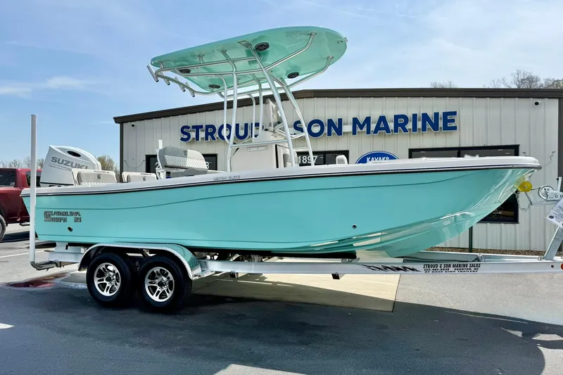 Slide: The Image of 2026 Carolina Skiff 21 Ultra Elite boat on trailer at Stroud & Son Marine. - 6