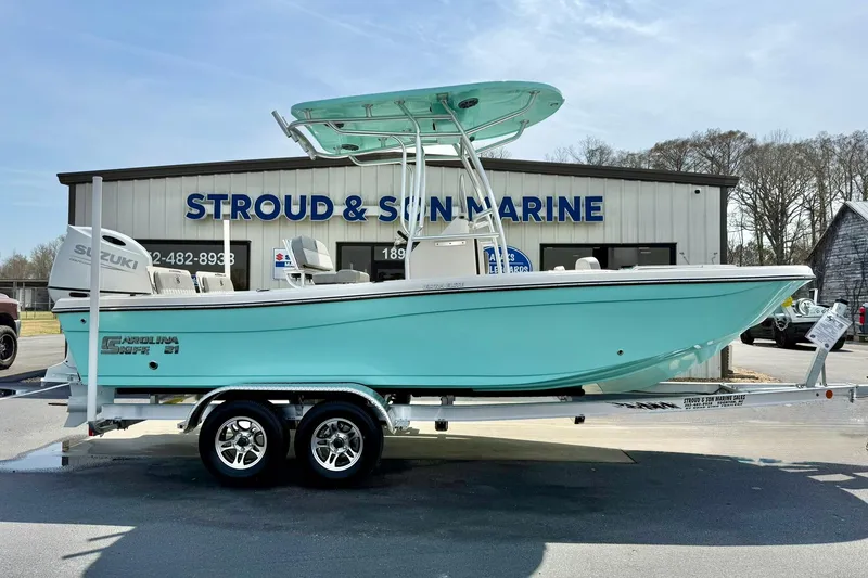 Slide: The Image of 2026 Carolina Skiff 21 Ultra Elite boat on trailer at Stroud & Son Marine. - 7