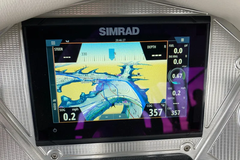 Slide: The Image of Simrad navigation display on 2021 Crest Caribbean Platinum 230 SLC boat dashboard. - 13