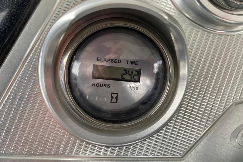 Slide: The Image of Elapsed time gauge showing 242 hours on a 2021 Crest Caribbean Platinum 230 SLC. - 14