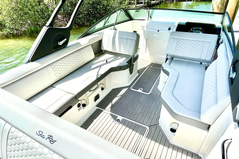 Slide: The Image of 2024 Sea Ray SDX 250 Outboard interior with luxurious seating and modern design. - 10