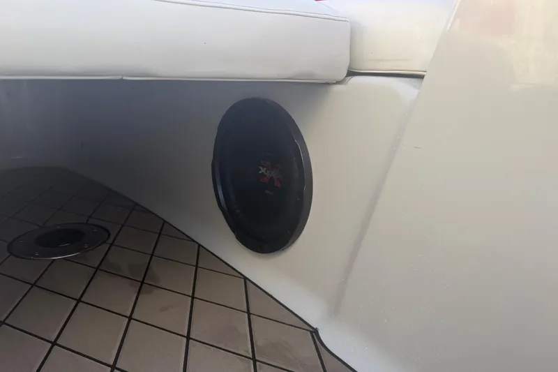 Slide: The Image of Speaker installed on a 2005 Crownline 270 BR boat, featuring a tiled floor. - 18