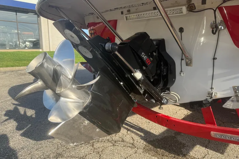 Slide: The Image of 2005 Crownline 270 BR boat with stainless steel propeller and SEI outdrive. - 19