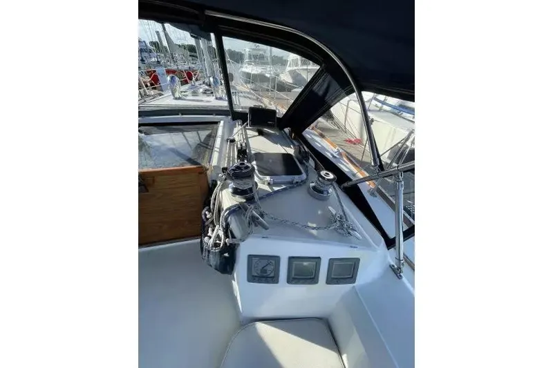 Slide: The Image of Cockpit of a 1990 Sabre 38 sailboat with navigation equipment and winches. - 4
