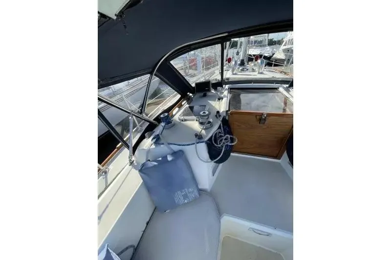 Slide: The Image of Interior view of a 1990 Sabre 38 sailboat cockpit with navigation equipment. - 5