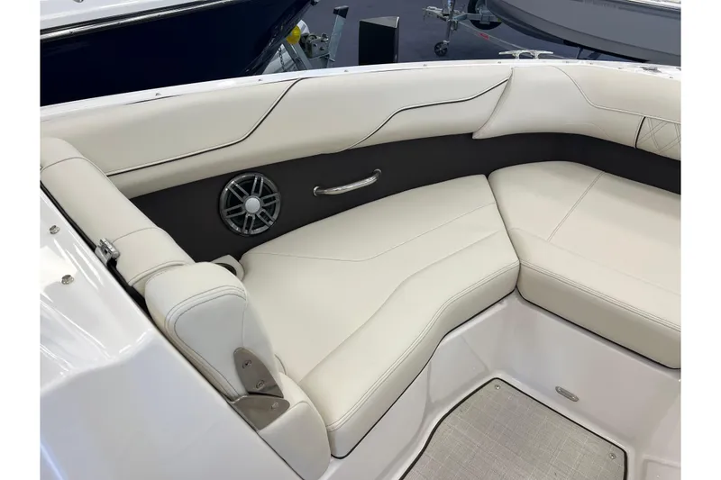 Slide: The Image of Luxurious seating in 2024 Regal LS2 boat with speaker and handle. - 19