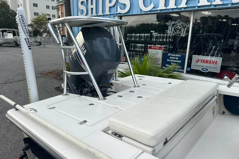 Slide: The Image of 2008 Hewes Redfisher 18 boat with Yamaha 150 engine at a marine service center. - 10