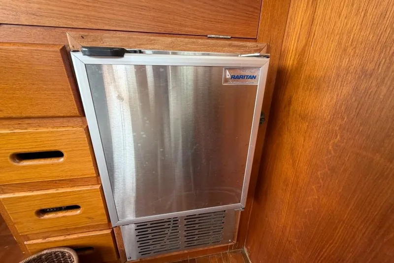 Slide: The Image of Stainless steel Raritan refrigerator on 1979 Grand Banks 42 Europa yacht interior. - 36