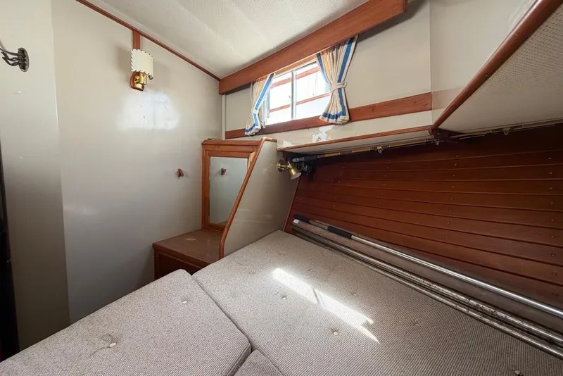 Slide: The Image of Cozy cabin interior of 1979 Grand Banks 42 Europa with bed and window. - 39