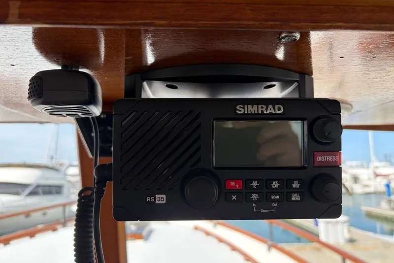 Slide: The Image of Simrad RS35 radio on 1979 Grand Banks 42 Europa yacht, docked at marina. - 50